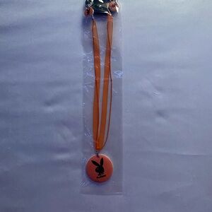 PLAYBOY Orange Bunny Logo Pendant Necklace with Ribbon Cord